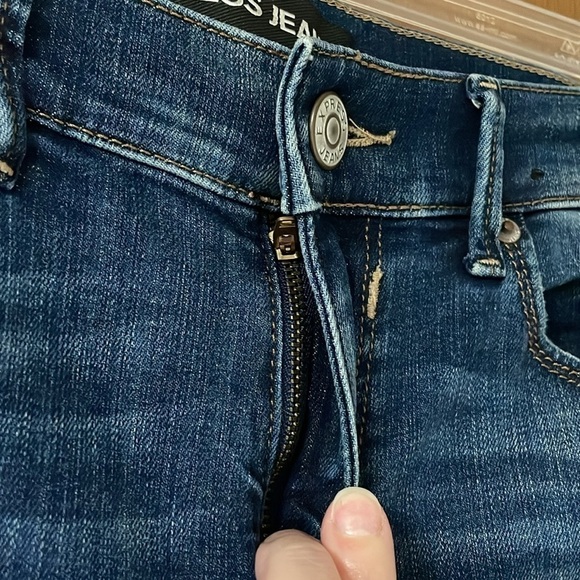 Express size 6 dark wash destress mid-rise jegging
jeans - Picture 8 of 14